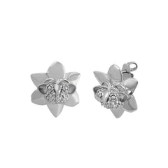 Aretes monstruos y flores